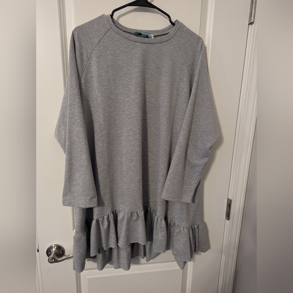 Terry ruffle bottom blouse